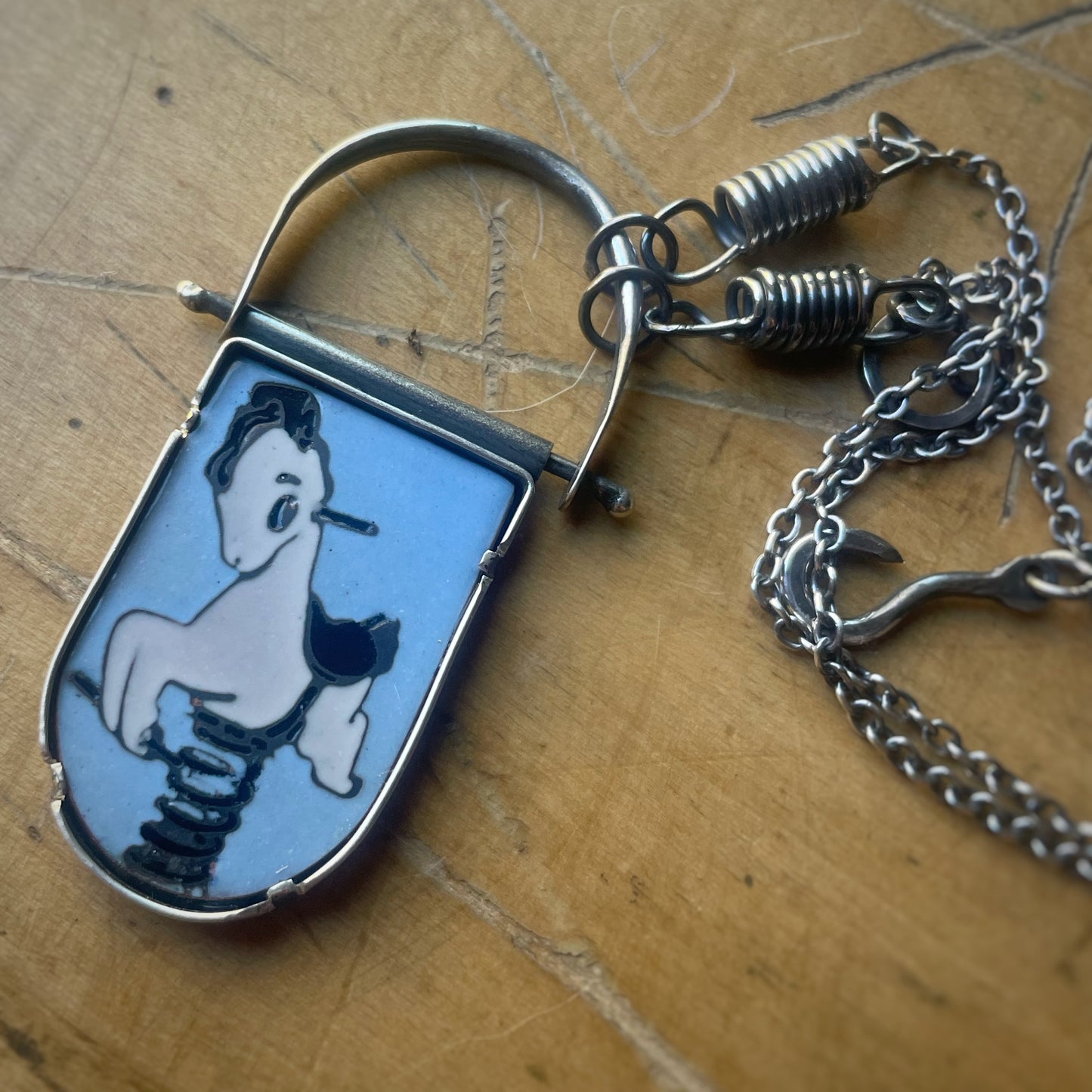 Champleve Swing Rider